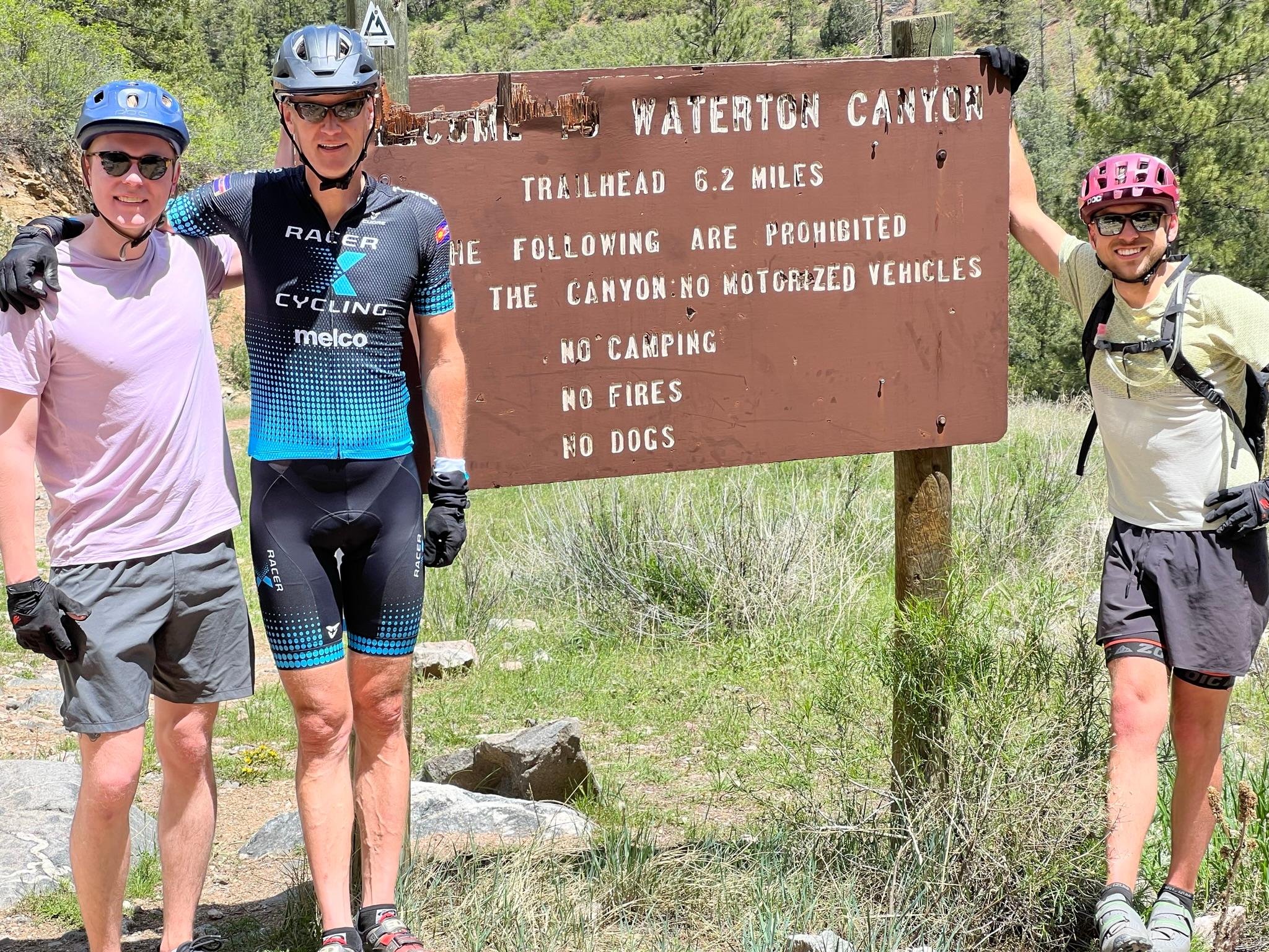 Sam mountain biking with his friends